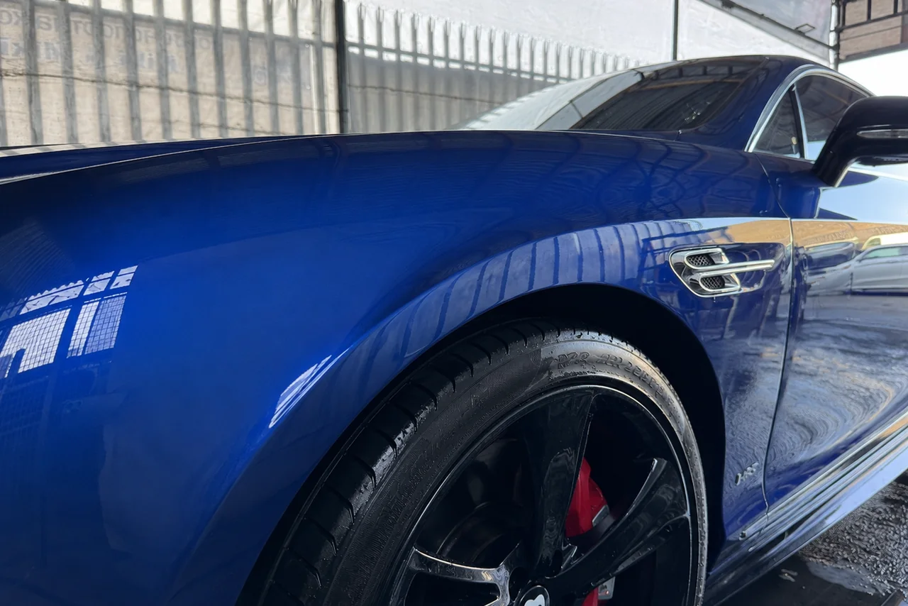 Freshly refinished blue performance car at GT Motors Centre